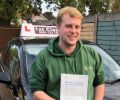 Gavin with Driving test pass certificate
